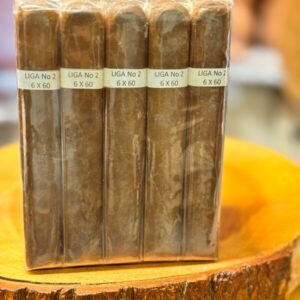 Bundle of five Nicaraguan Liga No 2 cigars with 6x60 ring gauge displayed in clear cellophane packaging on wooden base.