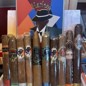 Collection of ten premium Harlem cigars displayed in cellophane packaging with colorful bands, arranged in a row against a vibrant Harlem-themed backdrop fea…