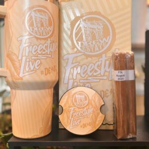 Freestyle Live Kit August 2025 collection featuring peach-colored tumbler, packaging, coaster, and wooden accessories displayed together.