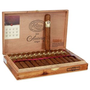 Padron 1964 Anniversary Series Imperial Natural cigars in open wooden box with gold bands and pink ribbon divider