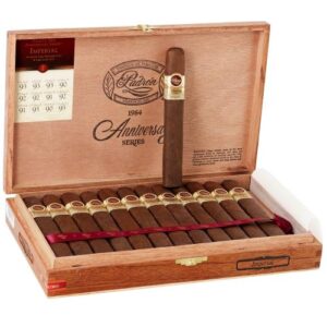 Padron 1964 Anniversary Series Imperial Maduro cigars in open wooden box with one cigar displayed above